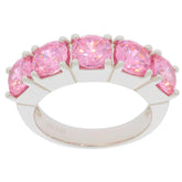 Round pink sapphire sterling silver ring with sparkling gemstones, showcasing elegance and luxury in a unique design.